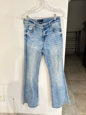 High-Rise Light Blue Flared Jeans by
